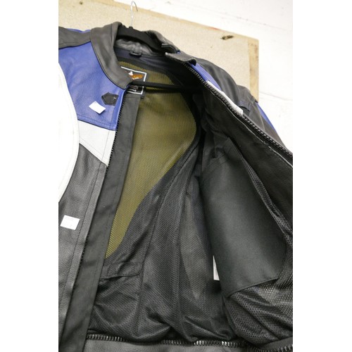 2324 - A set of blue and black motorbike leathers