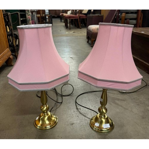 392 - A pair of brass table lamps