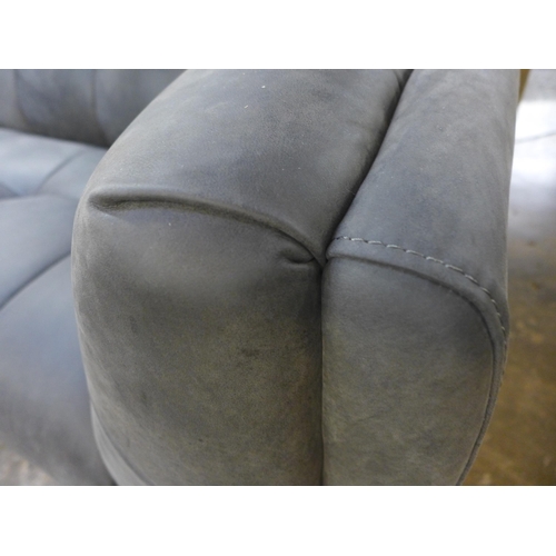 1358 - A Leo limestone leather two seater sofa * This lot is subject to VAT, RRP £2719