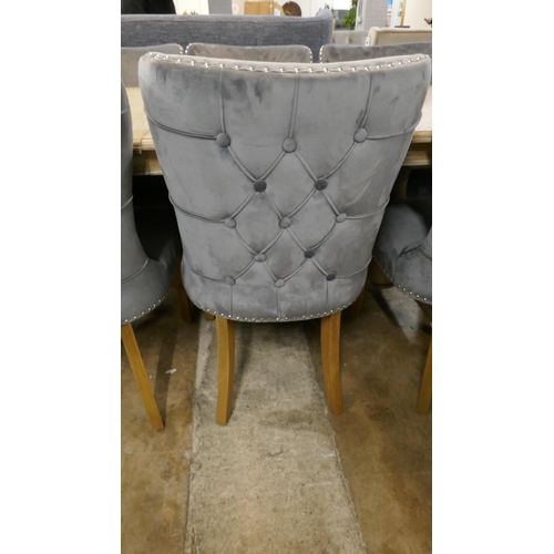 1416 - A set of eight grey velvet buttoned dining chairs * this lot is subject to VAT