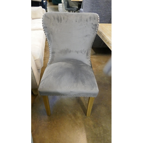 1416 - A set of eight grey velvet buttoned dining chairs * this lot is subject to VAT