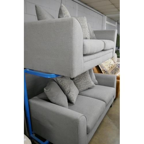 1437 - A pair of grey upholstered three seater sofas £1200