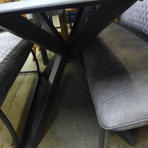 1468 - A charcoal ceramic dining table and two grey upholstered benches * this lot is subject to VAT