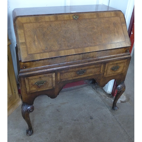 84 - A Queen Anne style walnut bureau de dame