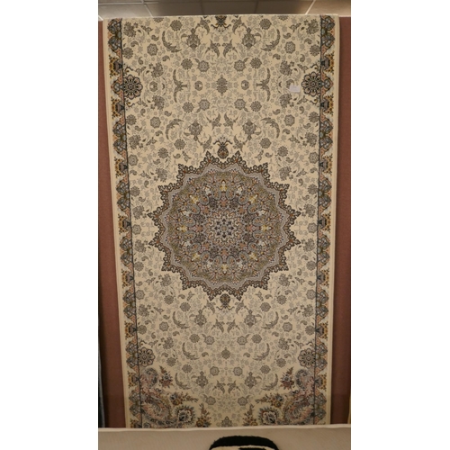 1572 - An ivory ground fine woven iranian runner, embossed floral medallion design, 300cm x 80cm