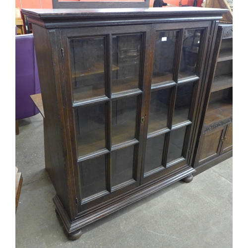 111 - A late 19th Century Dutch oak two door bookcase