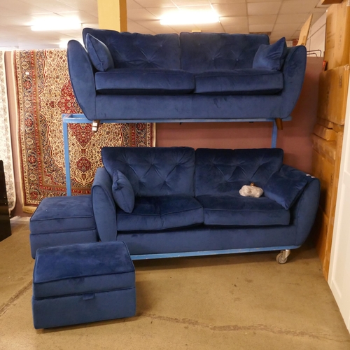 1577 - A pair Hoxton blue velvet upholstered three seater sofas with two footstools, RRP £2198