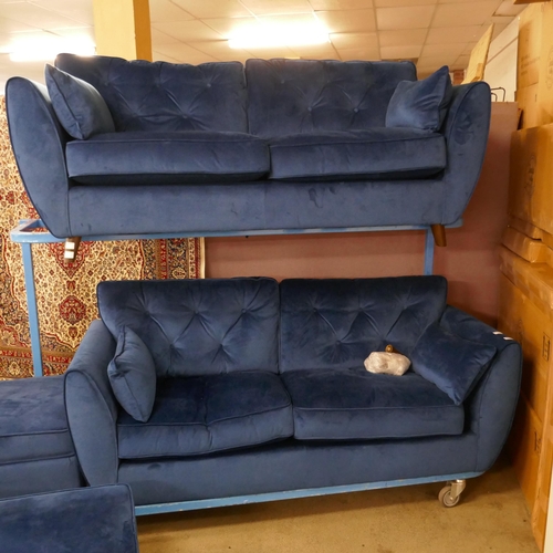 1577 - A pair Hoxton blue velvet upholstered three seater sofas with two footstools, RRP £2198