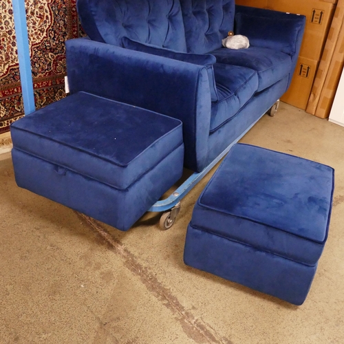 1577 - A pair Hoxton blue velvet upholstered three seater sofas with two footstools, RRP £2198