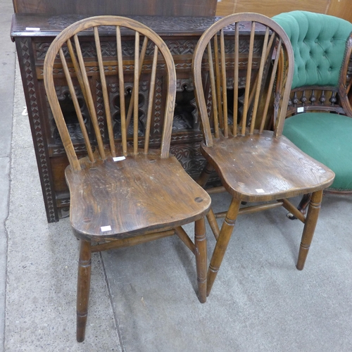 171 - A pair of elm and beech R.A.F. issue Windsor chairs