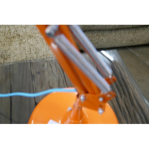 1312 - An orange angle poise lamp
