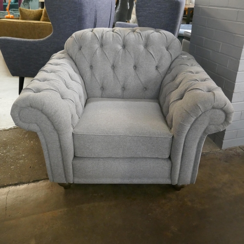 1401 - A Bordeaux grey upholstered Chesterfield armchair RRP £837