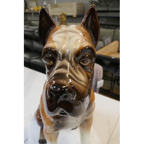 1459 - A glazed tall ornamental Boxer dog