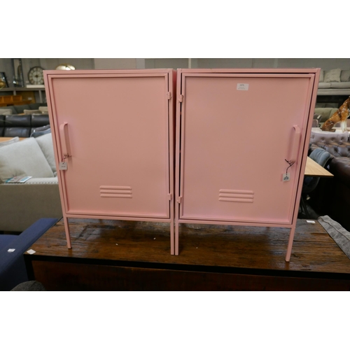1475 - A pair of pink metal cabinets