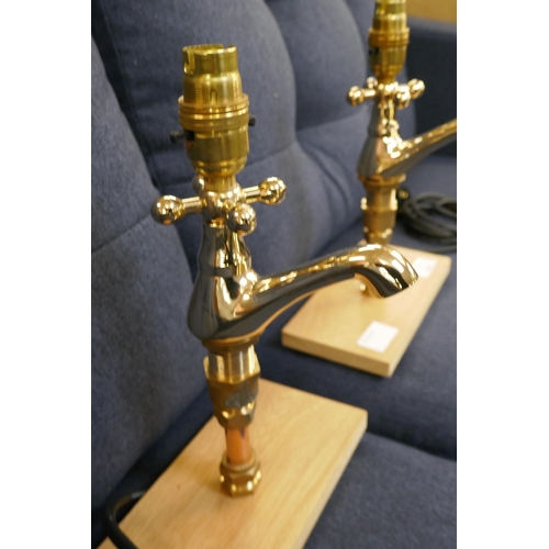 1482 - A pair of brass tap lamps