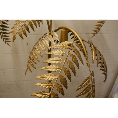 1504 - A gold floor standing fern lamp