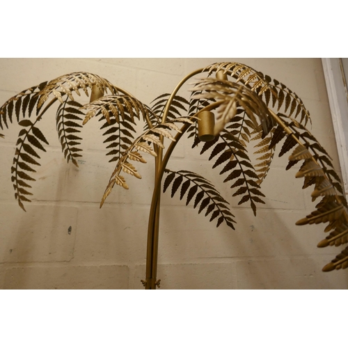 1504 - A gold floor standing fern lamp