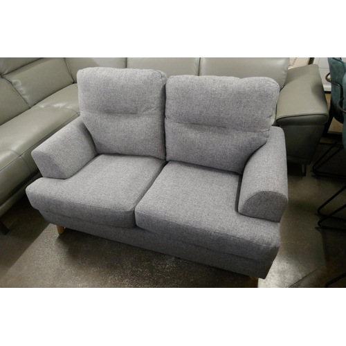 1507 - A compact grey hopsack two seater sofa