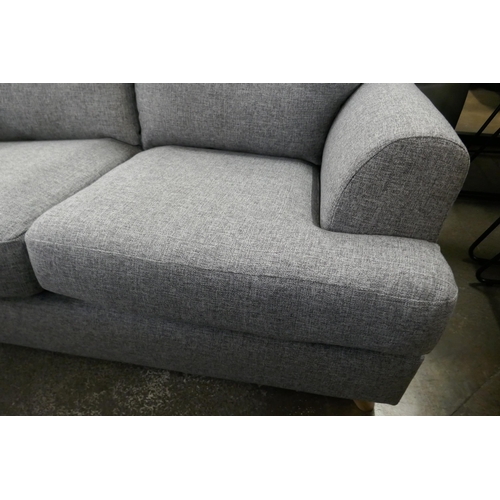 1507 - A compact grey hopsack two seater sofa