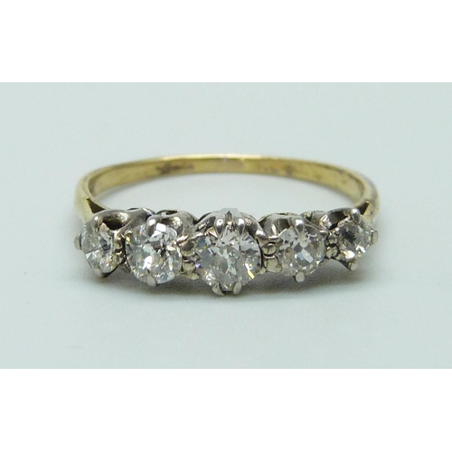 1008 - An 18ct gold, five stone diamond ring, approximately 0.70ct diamond weight, 2g, P