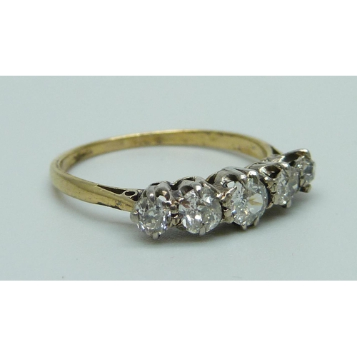 1008 - An 18ct gold, five stone diamond ring, approximately 0.70ct diamond weight, 2g, P