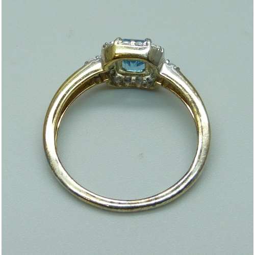 1020 - A silver gilt, Swiss blue topaz and white stone ring, U