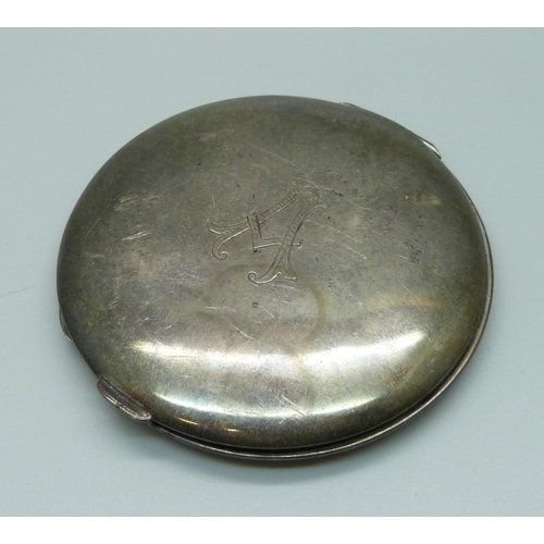 1027 - A hallmarked silver compact, 73.7g