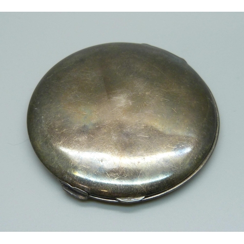 1027 - A hallmarked silver compact, 73.7g