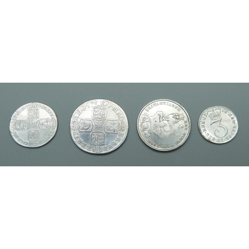 1043 - Four silver coins, including Queen Anne and George II