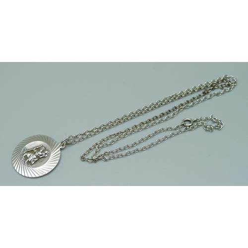 1067 - A silver Georg Jensen St. Christopher pendant on chain, chain 60cm