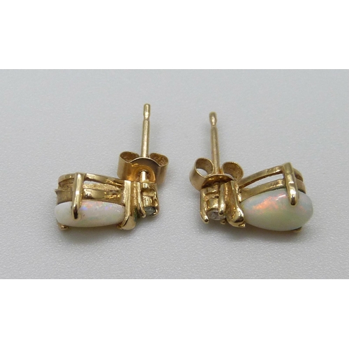 1071 - A pair of 9ct gold, opal and diamond earrings, 1g