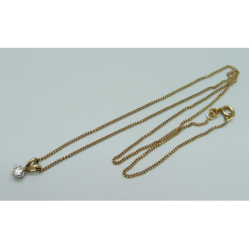 1073 - An 18ct gold and diamond pendant on an 18ct gold chain, 2.7g, chain 40cm