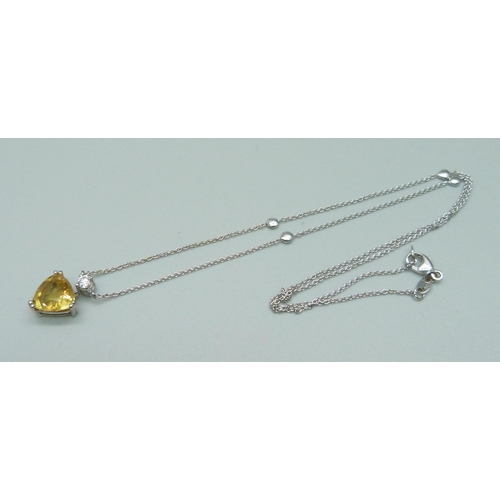 1080 - An 18ct white gold, diamond and citrine necklet, 4.4g, 40cm