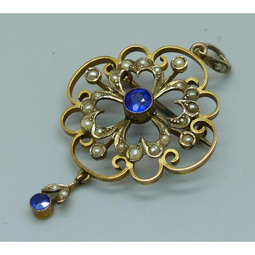 1081 - A 9ct gold brooch/pendant set with a blue stone and pearls, 4.2g