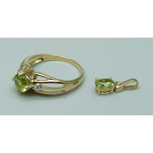 1084 - A 9ct gold ring set with peridot and diamonds and a 9ct gold pendant set with peridot, 3.3g, ring si... 