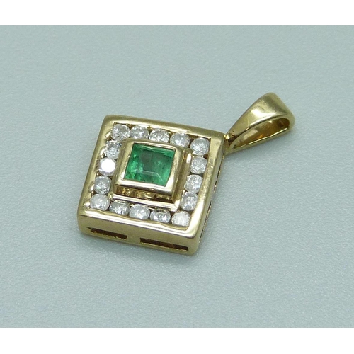 1092 - A 9ct gold, diamond and emerald pendant, 1.2g