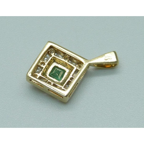 1092 - A 9ct gold, diamond and emerald pendant, 1.2g