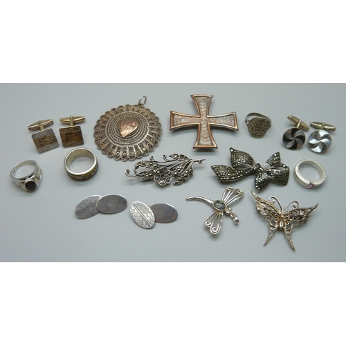 1100 - Four silver rings, four silver brooches, three pairs of silver cufflinks, a filigree pendant and a h... 