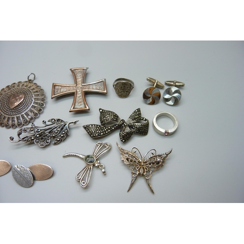 1100 - Four silver rings, four silver brooches, three pairs of silver cufflinks, a filigree pendant and a h... 