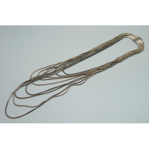 1115 - A silver multi strand necklace, 72g