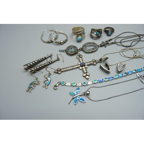 1118 - A collection of silver jewellery including a large silver cross pendant set with opal