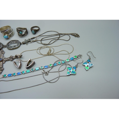 1118 - A collection of silver jewellery including a large silver cross pendant set with opal