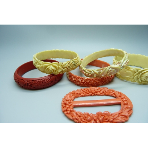 1121 - Five vintage plastic bangles and a buckle