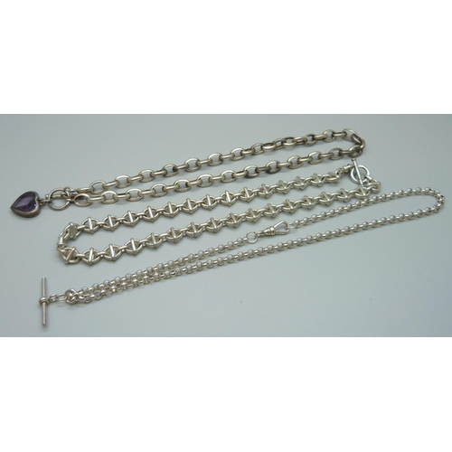 1127 - A silver necklace with T-bar and two other necklaces