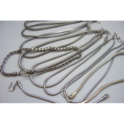 1128 - Nine metal necklaces and a bracelet