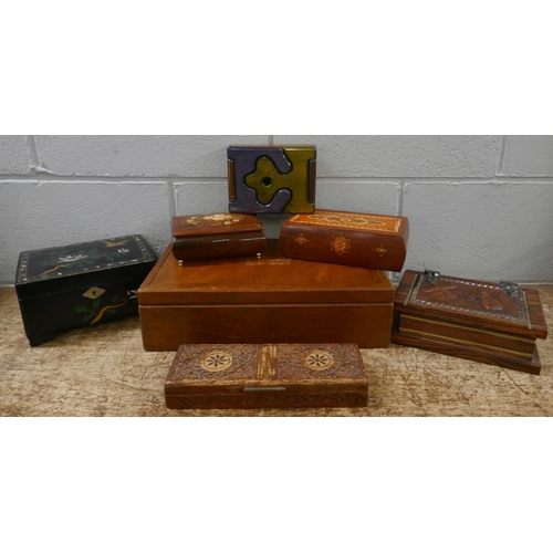 1131 - A collection of decorative boxes including carved and inlaid **PLEASE NOTE THIS LOT IS NOT ELIGIBLE ... 