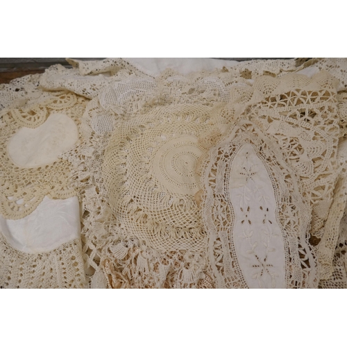 1132 - Thirty-three hand made lace doilies and a bead work screen cover