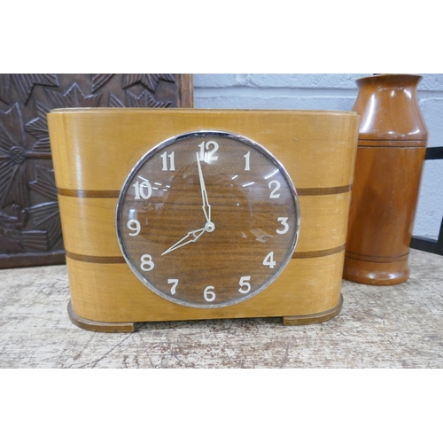 1133 - A coin clock, a wooden flask with handle and a carved panel **PLEASE NOTE THIS LOT IS NOT ELIGIBLE F... 