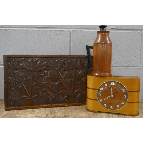 1133 - A coin clock, a wooden flask with handle and a carved panel **PLEASE NOTE THIS LOT IS NOT ELIGIBLE F... 