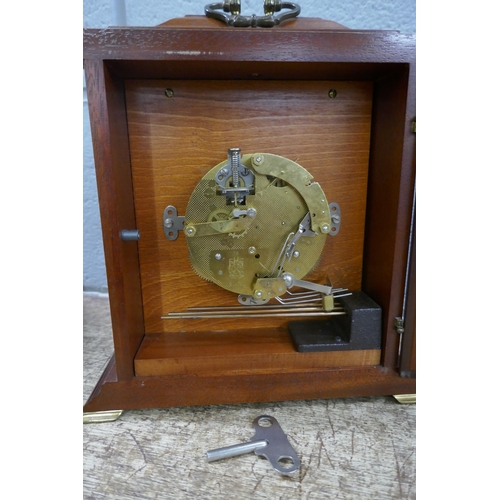 1139 - A Metamec wooden cased clock, a model of a German Shepherd and a decorative egg **PLEASE NOTE THIS L... 